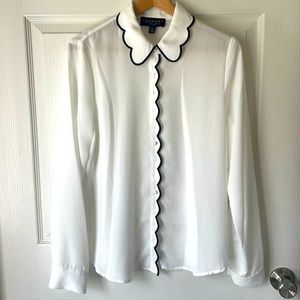 White silky blouse with black scallop detail and silk buttons by Laundry